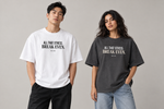 Concept mockup — All That Stress. Break Even. — Tee on two models.