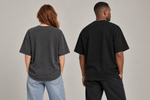Concept mockup — Compré. Perdón a Todos. — Tee, back view on two models.
