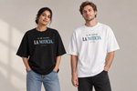 Concept mockup — Se Me Olvidó la Noticia — Tee on two models.