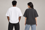 Concept mockup — Tocó Mi Stop y Se Fue — Tee, back view on two models.