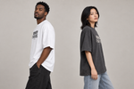 Concept mockup — Tocó Mi Stop y Se Fue — Tee, side view on two models.
