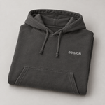 BBS-SINGLE|Pigment Black|folded|BB SIGN Signature — Premium Hoodie folded studio view