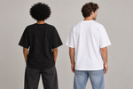 Concept mockup — Mi Último Trade — Embusteee — Tee, back view on two models.
