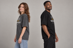 Concept mockup — XAUUSD Trader’s Heart — Tee, side view on two models.