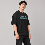 Trust in the Process oversized tee black side on model