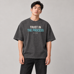 Trust in the Process oversized tee dark grey front on model