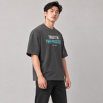 Trust in the Process oversized tee dark grey side on model