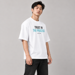 Trust in the Process oversized tee white side on model
