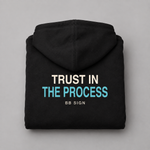 Trust in the Process zip hoodie black folded