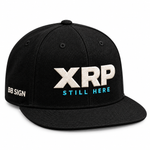 XRP: Still Here — Snapback Hat, Black, product angle on white background